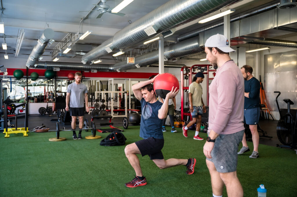 Group personal training session at a gym in Chicago with Finding Fitness