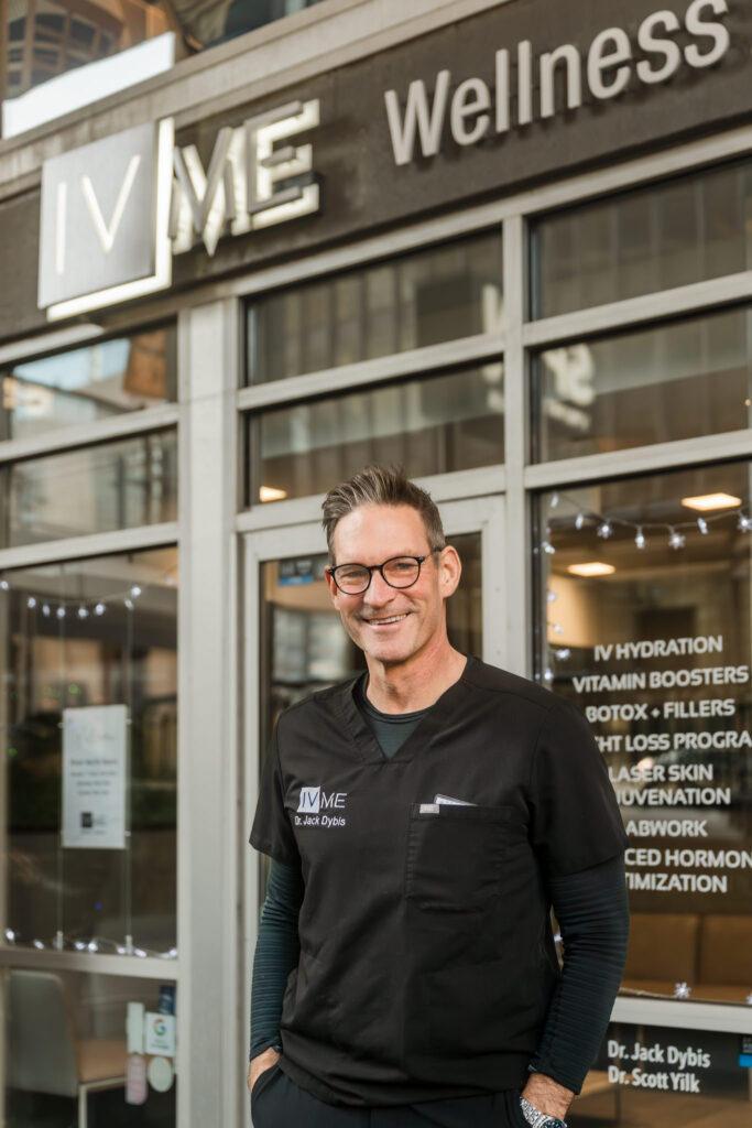 Surgeon Dr. Jack stands outside of IVME Wellness + Aesthetics in River North Chicago