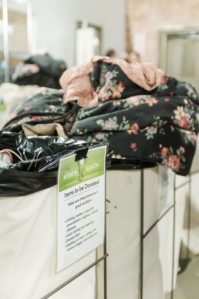 Piles of donations waiting to be sorted for families in need throughout Chicago