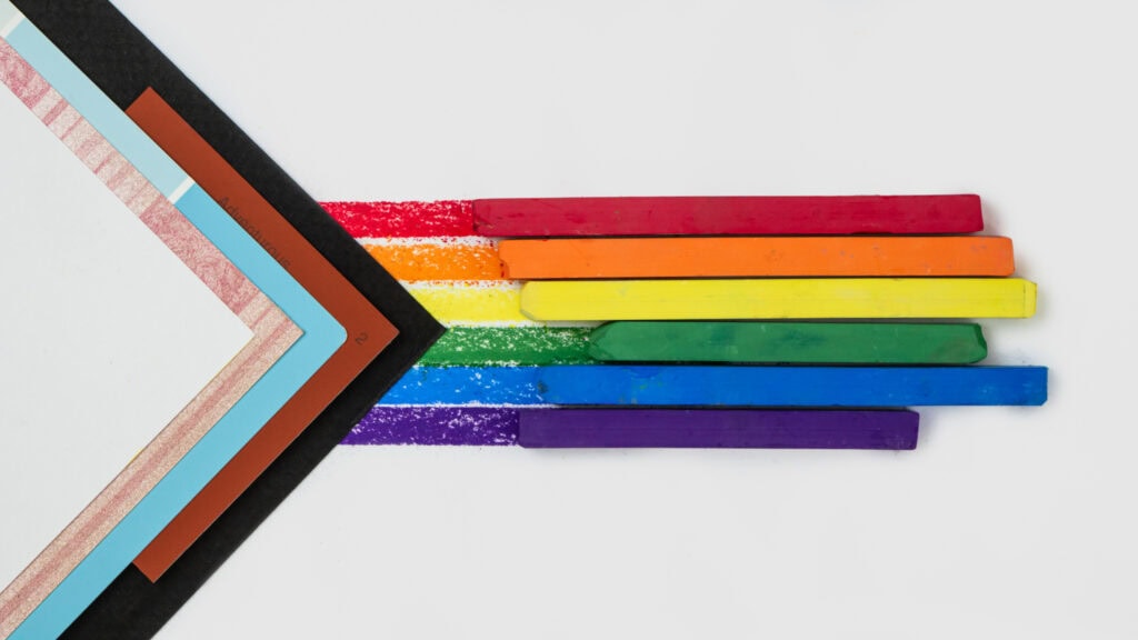 All-inclusive flag created with NuPastels, paint chips, and paper - image by Maija Martin of Chicago